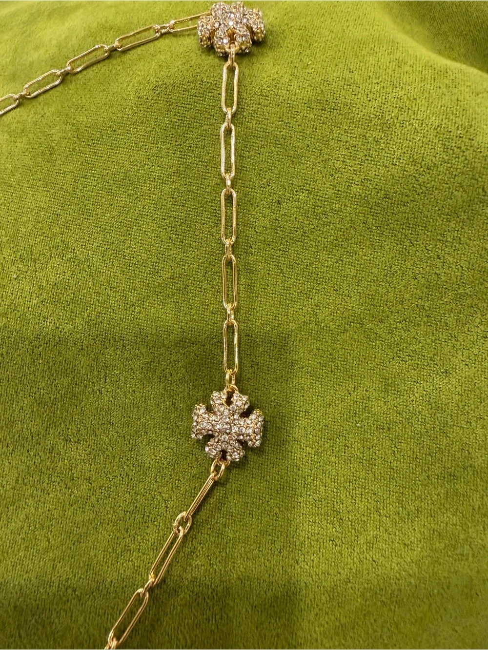 Tory Burch pave logo shape link necklace.
